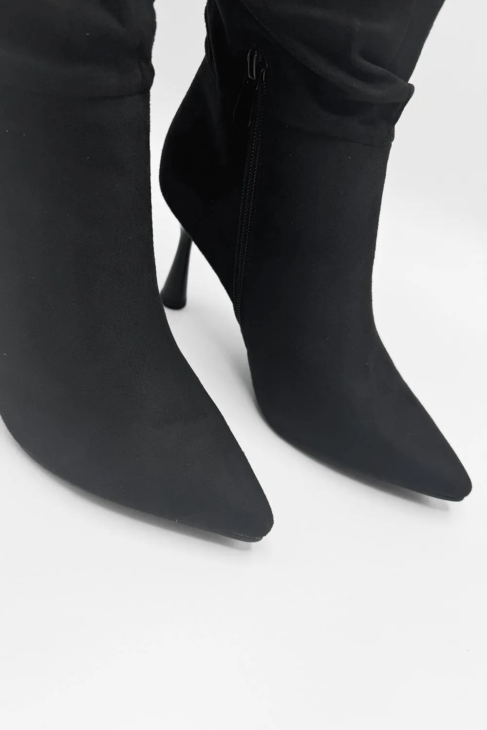 Advinee Ruched Pointed Toe Knee High Heeled Boots in Black Suede